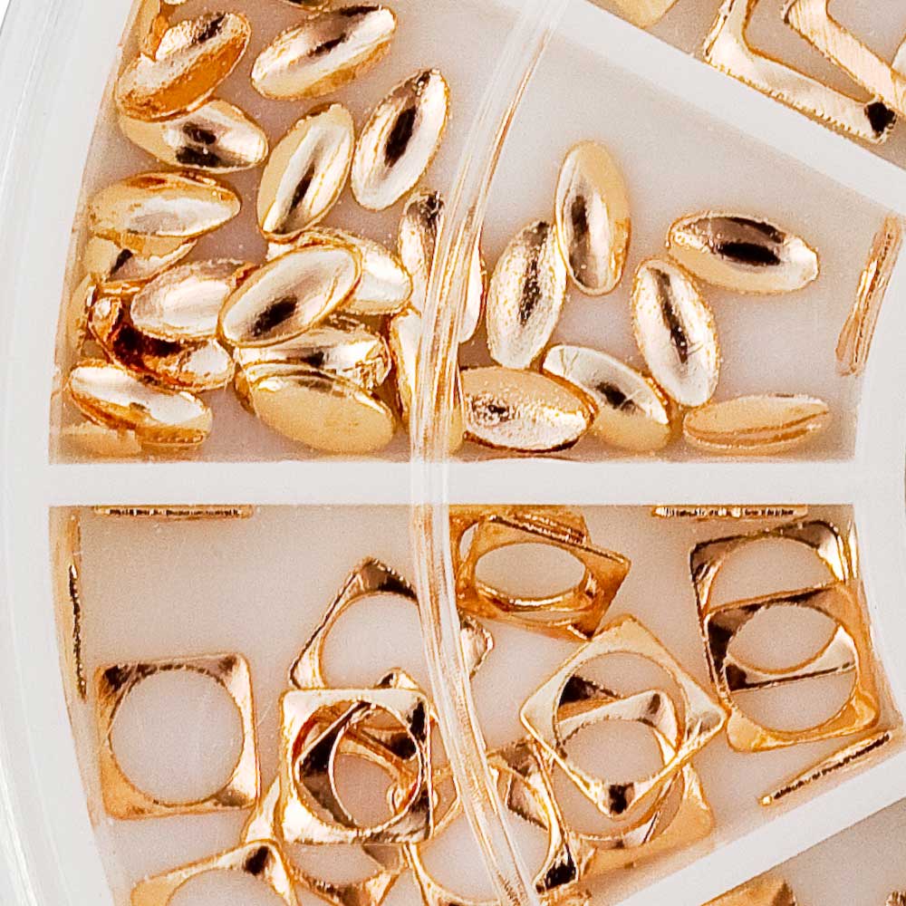 nail art box sa srebrnim rose gold ukrasima